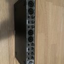 Černý rackový USB audio rozhraní s nápisy Roland a Rubix 44. Zařízení obsahuje dva identické vstupní kanály s konektory pro mikrofon a linku, každý v…