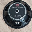 Černý kruhový reproduktor s kovovým rámem. Na středovém magnetu je bílý nápis CRAAFT SOUND RESEARCH, PROFESSIONAL LOUDSPEAKER a Model: TC-12/200, Pow…