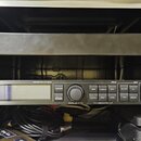 Černý rackový efektový procesor s nápisy G-MAJOR GUITAR PROCESSOR a t.c. electronic. Zařízení má modrý displej, několik ovládacích tlačítek a dva oto…