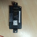 Černý plastový modul s elektronickými součástmi a konektory. Na bílém štítku je nápis PTP5004 EMG RA-373C BLK a dále texty EMG B3124B, EMG RA-B-C, US…