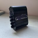 Černý kompaktní mixér s nápisy ARTcessories a MY Monitor II Personal Monitor Mixer. Na boku jsou čtyři ovratové ovládací knoflíky a vstup označený ja…