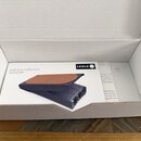 Otevřená bílá krabice, ve které leží bílý papírový návod s nápisy LEHLE DUAL EXPRESSION QUICKSTART a logem LEHLE. Na návodu je vyobrazen šedý pedál s…