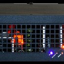 Černý rackový koncový zesilovač s madly po stranách a mřížkou v přední části. Na levé straně je nápis MATRIX a přepínač POWER ON, vpravo nápisy GT160…