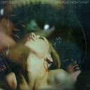 Obal CD s nápisy DEFTONES v levém horním rohu a SATURDAY NIGHT WRIST v pravém horním rohu. V centre je stylizovaný, rozmazaný obraz ženy s hlavou zak…