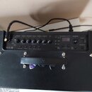 Černý kytarový kombo zesilovač s nápisem ID:X 50. Přední panel obsahuje ovládací knoflíky s popisky VOICE, GAIN, VOLUME, BASS, MIDDLE, TREBLE a MASTE…