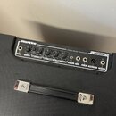 Černý basový kombozesilovač s nápisy Hartke, HYDRIVE SPEAKER TECHNOLOGY a HD 508. Ovládací panel obsahuje knoflíky VOLUME, BASS, MID a TREBLE, přepín…