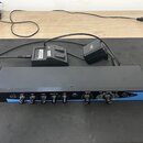 Černý rackový efektový procesor s nápisem lexicon a označením MPX 110 Dual Channel Processor. Přístroj má na předním panelu řadu ovládacích knoflíků…