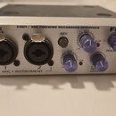 Stříbrný zvukový interface s nápisy PreSonus DIGITAL audio, 24BIT / 96K FIREWIRE RECORDING INTERFACE a FIREBOX. Přední panel obsahuje dva XLR vstupy…