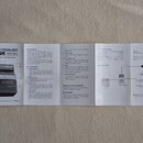 Fotografie zobrazuje rozložený papírový návod k obchodu s názvem BASS EQUALIZER ARION MODEL MEQ-2. Text je psán v angličtině a obsahuje sekce FEATURE…