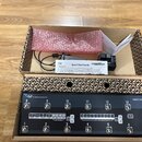 Černý efektový spínací systém G2 THE ADVANCED SWITCHING SYSTEM značky GIGARIG. Zařízení obsahuje 14 stomečovacích přepínačů, řadu tlačítek s nápisy j…