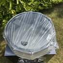 Kruhové tělo bubnu s kovovým obručováním, které je z wrapované průhledné fólie. Na membráně je viditelný nápis SONOR a pod ním text aluminium resonan…