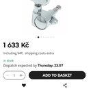 Fotografie znázorňuje jeden chromovaný ladicí mechanismus s oválným knoflíkem. Na boku mechanismu je vyryt nápis GROVER. Povrch je hladký a lesklý be…