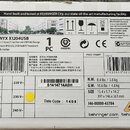 Fotografie znázorňuje kartónové balení s produktem XENYX X1204USB. Na krabici jsou nápisy „XENYX X1204USB“, „BEHINGER City“ a logo „CE“. Viditelná js…
