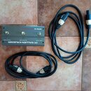 Šedý ovladač s nápisem GALLIEN-KRUEGER a označením RFB-III REMOTE Foot Controller. Zařízení má čtyři stisknutelná tlačítka s popisky TUNING MUTE, CHA…