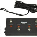 Černý efektový pedál s nápisy Ibanez a IFS4X. Na horní ploše jsou čtyři stoupací spínače s popisky OVERDRIVE, CHANNEL, X MODE a REVERB, z nichž jsou…