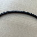 Černý audio kabel s bílým nápisem na plášti. Text zní: SC-THE STAGE 22 • highflex [OFC] • 1x2x0,22mm² (AWG24) • by SOMMER CABLE Germany. Povrch kabel…