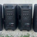 Čtyři černé reproduktory, přičemž dva krajní jsou v textilních krycích obalech s bílým logem a nápisem soundsation. Dva prostřední reproduktory jsou…