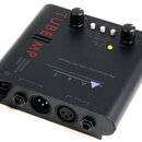 Černý předzesilovač s kovovým povrchem. Na horní straně je nápis TUBE MP, logo ART a text PROFESSIONAL TUBE MIC PREAMP s doplňkem APPLIED RESEARCH AN…