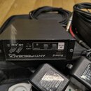 Černý kovový přístroj s nápisy Roland ANTI-FEEDBACK AF-70. Na předním panelu jsou tlačítka CLEAR, SET a START, kontrolky POWER a PEAK, přepínač AUTO…