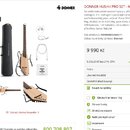 Snímek zobrazuje set elektroakustických cestovních kytar v přirozené barvě dřeva s černým pouzdrem a příslušenstvím. Na kytáře i pouzdře je vidět náp…