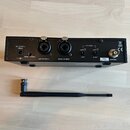 Černý obdélníkový接收ač s dvěma vstupy a ovládacími prvky. Na zařízení jsou nápisy DC 12-18V 300mA, MONO STEREO, LEFT AF INPUT, RIGHT AF INPUT, AF LEVE…