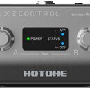 Šedý bezdrátový MIDI kontrolér s dvěma stříbrnými otočnými ovladači. Na horní části je nápis PULZECONTROL a Wireless MIDI Controller, ve spodní části…
