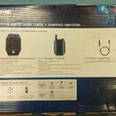 Fotografie znázorňuje zadní stranu kartonové krabice od bezdrátového systému GLX-D DIGITAL WIRELESS GUITAR PEDAL SYSTEM značky SHURE. Na obalu jsou v…