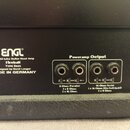 Zadní panel černého kytarového komba s nápisem ENGL, 60 W All-tube Guitar Head Amp Fireball TYPE E625 designed by Horst Langer MADE IN GERMANY. V sek…