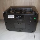 Zadní strana černého kompaktního kytarového komba značky JOYO. Na štítku je uveden text: MICRO AMPLIFIER FOR ELECTRIC GUITAR, MODEL: MA-10, POWER SUP…