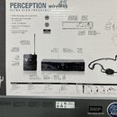 Fotografie znázorňuje produktovou krabici bezvívodového systému s nápisem PERCEPTION wireless 45. Na obalu jsou zobrazeny tři komponenty: vysílač PT…