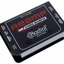 Černý reamp box s bílým spodním základem. Na horní straně je nápis REAMP, JCR STUDIO REAMPER™, JOHN CUNIBERTI ORIGINAL CIRCUIT a logo Radial engineer…