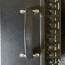 Fotografie zachycuje horní ovládací panel černého kytarového komba. Na panelu je nápis KATANA-50 MKII s logem značky Boss. V horní části je vstup INP…