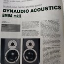Fotografie zachycuje stránku z časopisu s recenzí studiových monitorů. V horní části je velký černý nápis DYNAUDIO ACOUSTICS a pod ním model BM6A mkI…