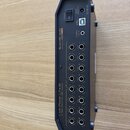 Zadní strana černého elektronického zařízení s více výstupy. Na šasi jsou nápisy „cymatic audio“, „powered by BEATWAVE“ a „Live Player LPx16 16 Track…