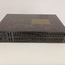 Černý rackový grafický ekvalizér s nápisem YAMAHA GRAPHIC EQUALIZER MODEL GE2031A. Přední panel obsahuje dvě řady posuvníků pro kanály CH A a CH B, p…