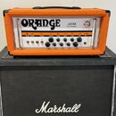 Kytarový kombozesilovač v oranžovém potahu s nápisy ORANGE a AD30 Twin Channel. Přední panel obsahuje ovládací prvky, přepínače POWER a STANDBY a vst…