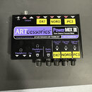 Černý kompaktní mixér s nápisy ARTcessories™, PowerMIX III a Three Channel Personal Mixer. Na spodní části je uveden text Designed & Distributed by:…