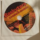 Fotografie znázorňuje kompaktní disk (CD) v papírovém obalu. Na disku je nápis „Baskytara v rocku a metalu“, jméno „MAREK HARUŠTIAK“ a text „ŠKOLA HR…