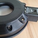 Černý plastový elektronický trigger s nápisem OUTPUT u jednoho z konektorů. Na bočním panelu je uveden model PDX-8, označení DUAL TRIGGER PAD a značk…
