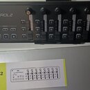 Černý USB kontrolér s nápisy KORG a nanoKONTROL2. Zařízení obsahuje osm posuvníků, osm otočných knoflíků a několik ovládacích tlačítek s popisky jako…