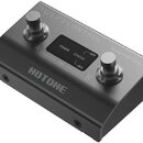 Černý bezdrátový MIDI kontrolér s dvěma stoupacími spínači. Na horní části je nápis PULZECONTROL a Wireless MIDI Controller, na přední straně značka…