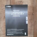 Fotografie znázorňuje černý obal uživatelské příručky. V horní části je bílé logo YAMAHA a nápisy DIGITÁLNÍ KLAVIATURA, DIGITAL KEYBOARD, PSR E453 a…