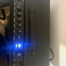 Černý kytarový kombozesilovač s nápisem MUSTANG LT50. Přední panel obsahuje ovládací knoflíky Gain, Volume, Treble, Middle, Bass a Master, vstupy Inp…