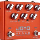 Oranžový efekt pedál s kovovým povrchem. Na horní straně se nachází sedm chromovaných otočných ovladačů s popisky OCTAVI, DRY, GAIN, FUZZ, DRY-TONE,…