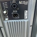 Detail zadní strany aktivního reproduktoru značky RCF, model Art 725-A 7series. Na černém ovládacím panelu jsou nápisy LIMITER, SIGNAL, STATUS, POWER…