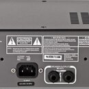 Zadní strana šedého elektronického zařízení s několika konektory a textovými popisky. Uprostřed je napájecí vstup s nápisem AC INPUT 220-240V, 50-60H…
