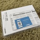 Fotografie zachicuje uživatelský manuál v originálním plastovém obalu. Na obálce je nápis MICRO BR DIGITAL RECORDER BR-80 Owner's Manual a logo BOSS.…