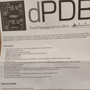 Fotografie zachycuje část uživatelské příručky k zařízení s názvem dPDB Dual Passive Direct Box. V horní části je vidět schéma zapojení a logo ART (A…
