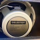 Fotografie zachycuje zadní stranu reproduktoru značky CELESTION. Na zlatavé štítku je uveden Model G12 M, Power capacity 65 WATTS, Impedance 16 OHMS…