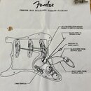 Fotografie zobrazuje papírový návod s technickým schématem zapojení snímačů. V horní části je logo Fender a nápis FENDER HOT NOISELESS STRATO PICKUPS…